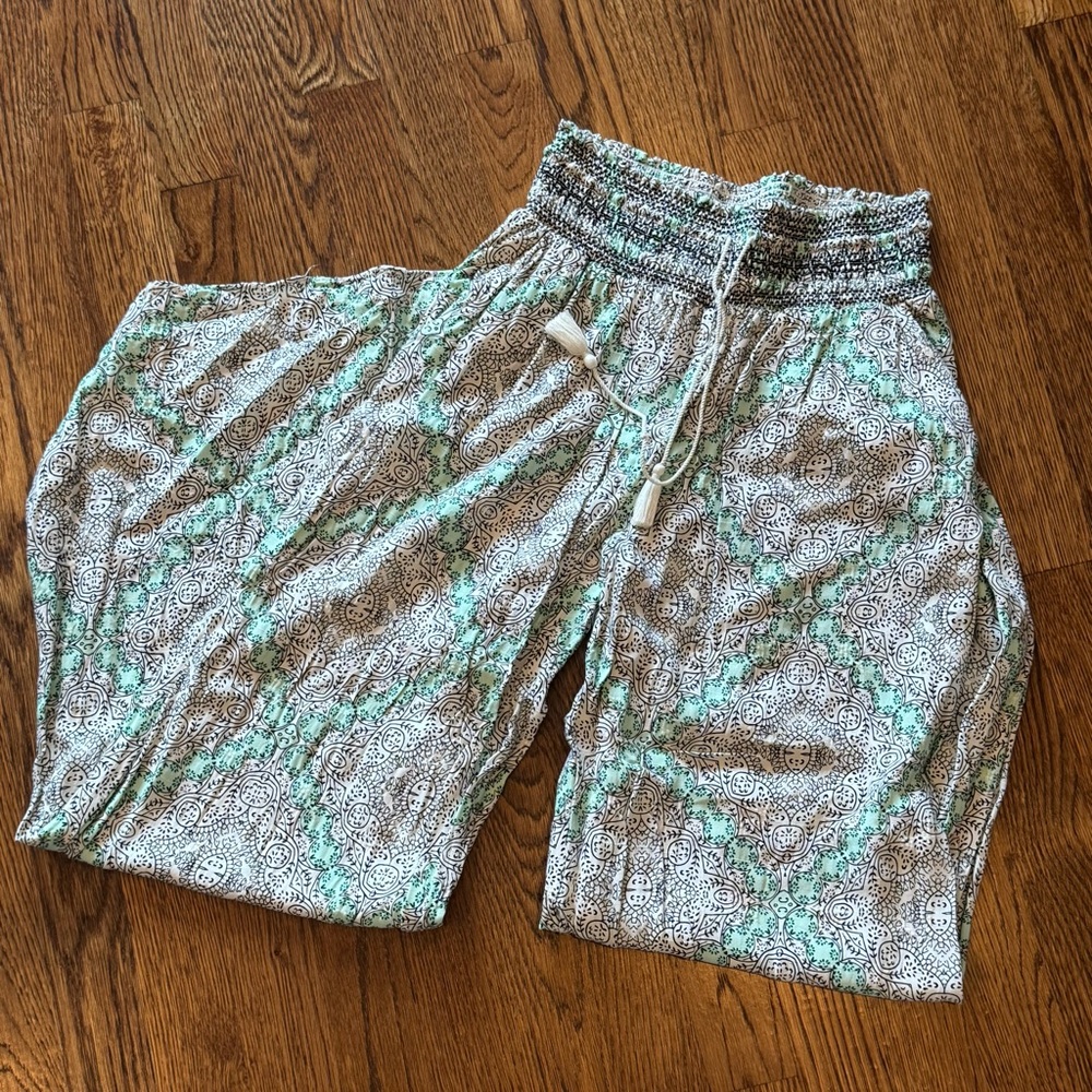 Anthropologie white, green, and black patterned flowy pants